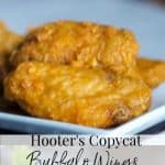 Make the infamous Hooter's Buffalo Wings at home with a few simple ingredients. This copycat recipe is perfect for game day snacking too!