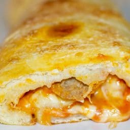 Meatball Stromboli made with your favorite Italian meatballs, sauce and pizza dough are perfect for Friday pizza nights or game day festivities.