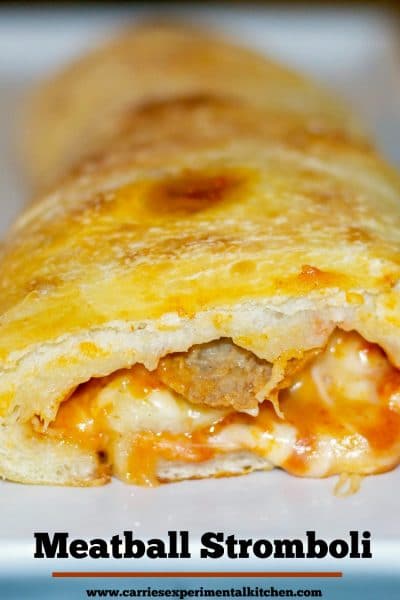 Meatball Stromboli made with your favorite Italian meatballs, sauce and pizza dough are perfect for Friday pizza nights or game day festivities.