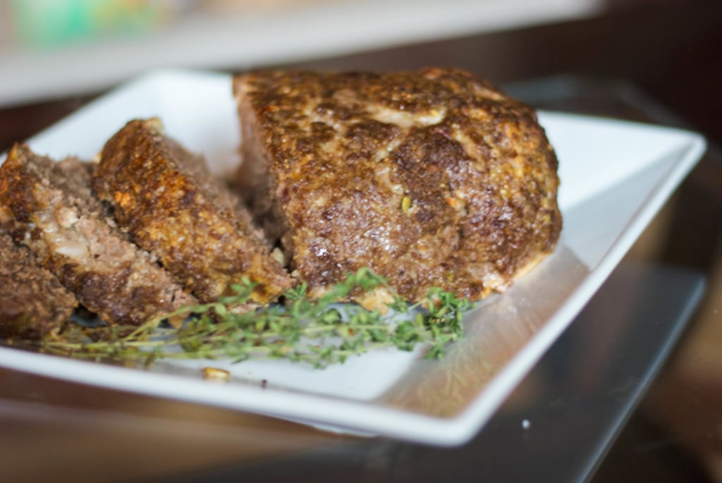 A close up of Balsamic Meatloaf on a white plate. 