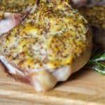 A simple coating consisting of prepared horseradish, whole grain Dijon mustard and rosemary that adds a ton of flavor to these pork chops.
