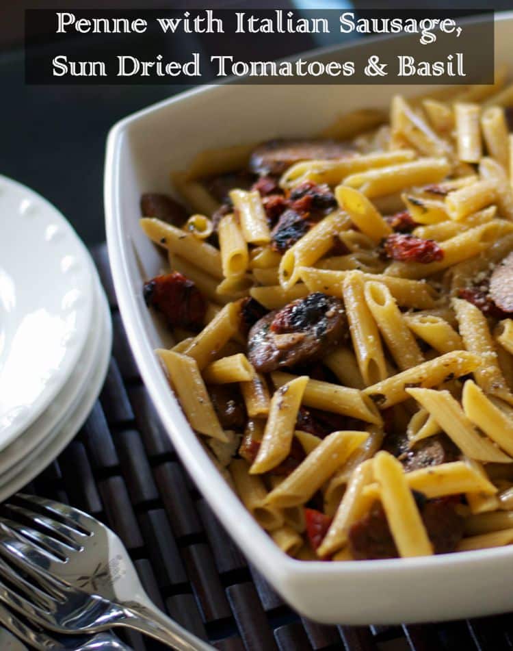 A bowl of food, with Sausage and Penne