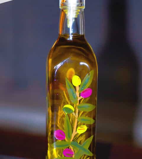A bottle of oil on a table