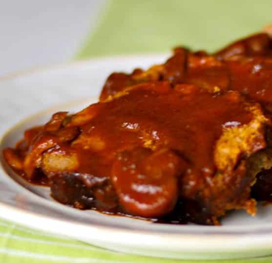 Meatloaf made with lean ground beef, mushrooms and spices in at tomato based sauce.
