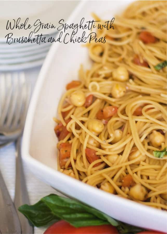 Whole grain spaghetti tossed with homemade tomato bruschetta, chick peas and grated Pecorino Romano cheese is a tasty, quick weeknight dinner. 