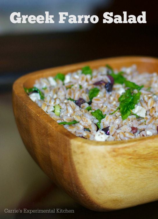  Greek Farro Salad made with Kalamata olives, spinach, oregano and Feta cheese in a light lemon vinaigrette.