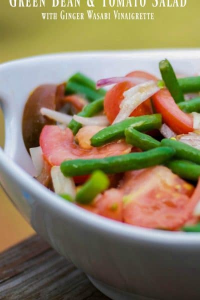 A bowl of Green Bean and Tomato Salad with Ginger Wasabi Vinaigrette