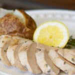Boneless chicken breasts marinated in a brine made with sea salt, sugar, fresh thyme, lemon juice and zest; then grilled is super juicy. 