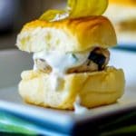 Mediterranean Turkey Sliders made with lean ground turkey, Kalamata olives, Feta cheese, and oregano on top of a sweet slider bun.