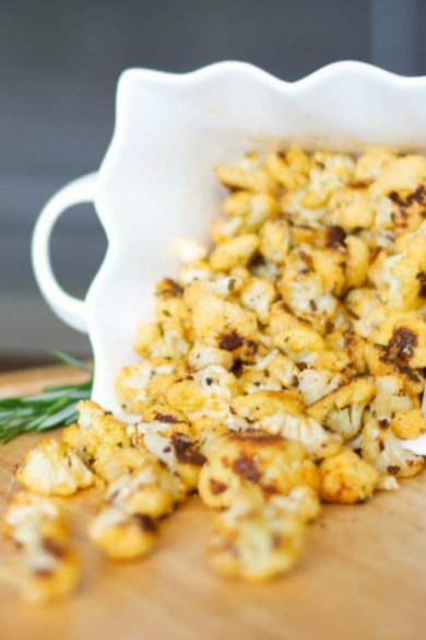 Paprika, Rosemary & Cheese Cauliflower Popcorn made with garden fresh cauliflower; then roasted with paprika, rosemary and Parmesan cheese.