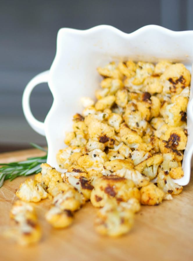 Paprika, Rosemary & Cheese Cauliflower Popcorn made with garden fresh cauliflower; then roasted with paprika, rosemary and Parmesan cheese.