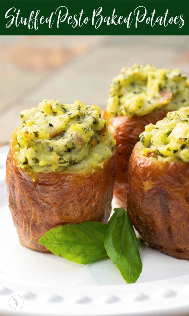 Stuffed baked potatoes made with fresh basil pesto and spices; then baked until super creamy and delicious makes a super flavorful side dish.
