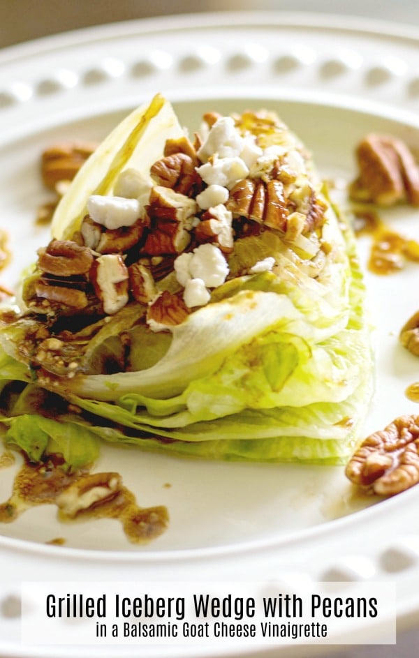  Grilled Iceberg lettuce wedge salad topped with whole pecans and crumbled Goat cheese; then drizzled with a balsamic vinaigrette. 