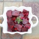 a bowl of pickled beets on the table