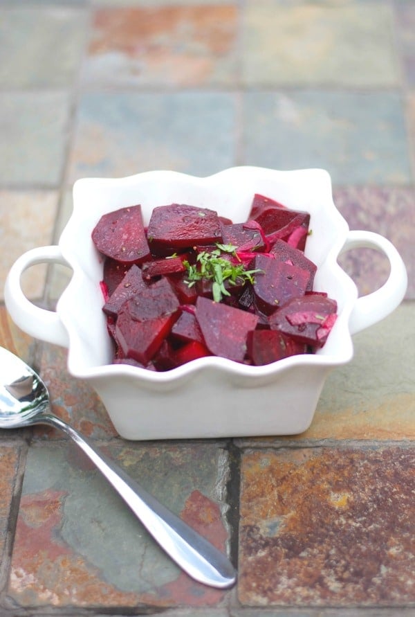 Make your own Pickled Beets at home with fresh beets and red onions marinated in white balsamic vinegar, extra virgin olive oil, sugar and fresh tarragon.