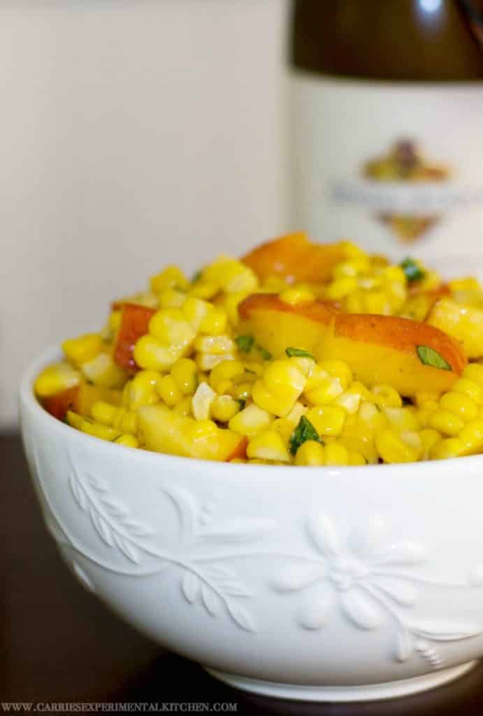 This Corn & Peach Salad is refreshingly light with a hint of sweetness. The perfect use for leftover summer corn on the cob. 