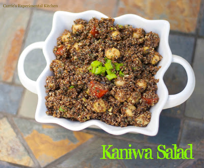 A bowl of pesto chick pea and kaniwa salad