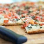 Caprese Flatbread on cutting board