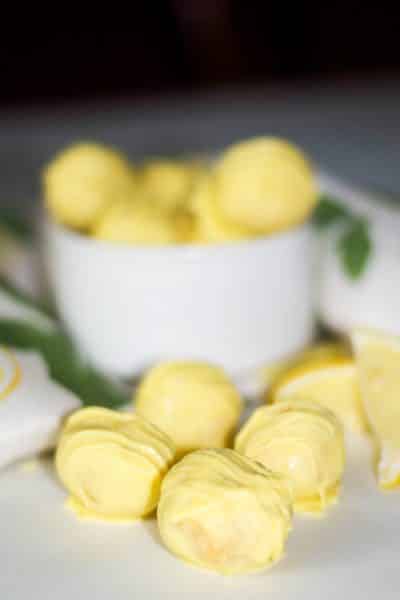 Oreo Lemon Drops are a delicious lemony dessert using Lemon Twist Oreo's, fat free cream cheese and lemon extract; then dipped in white chocolate.