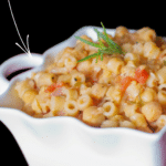 a bowl of pasta with chick peas