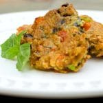 Learn how to make this tasty Greek style side dish for Eggplant Fritters with grated eggplant, garlic, basil, tomatoes and scallions.