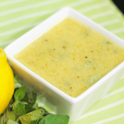 a close up of ladolemono in a bowl