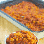 Linda's Portuguese Baked Beans made with Navy beans, Portuguese chorizo, peppers, garlic in a tomato-based sauce.