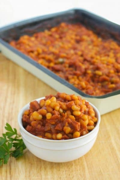 Navy beans cooked with Portuguese chorizo, peppers, garlic and tomatoes in a tomato based sauce.
