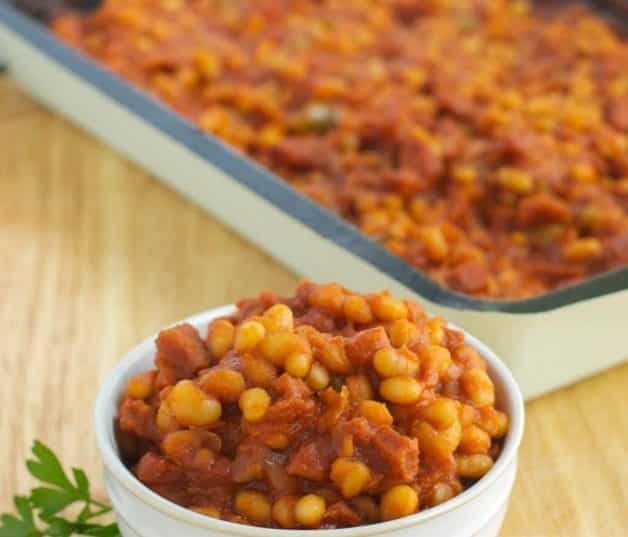 Navy beans cooked with Portuguese chorizo, peppers, garlic and tomatoes in a tomato based sauce.