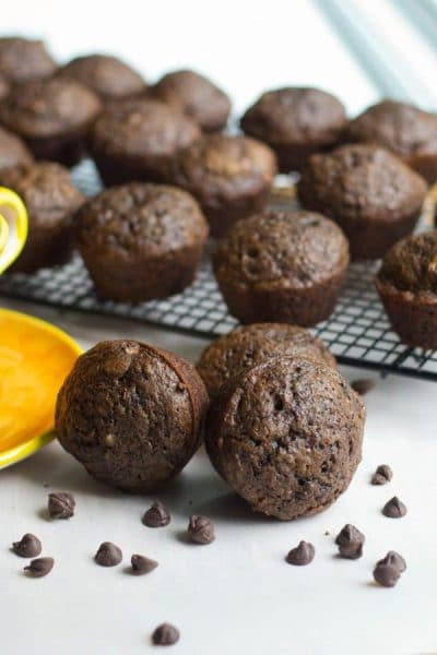 Triple Chocolate Zucchini Muffins made with cocoa powder, semi sweet and dark chocolate are so chocolatey, you won't be able to eat just one.