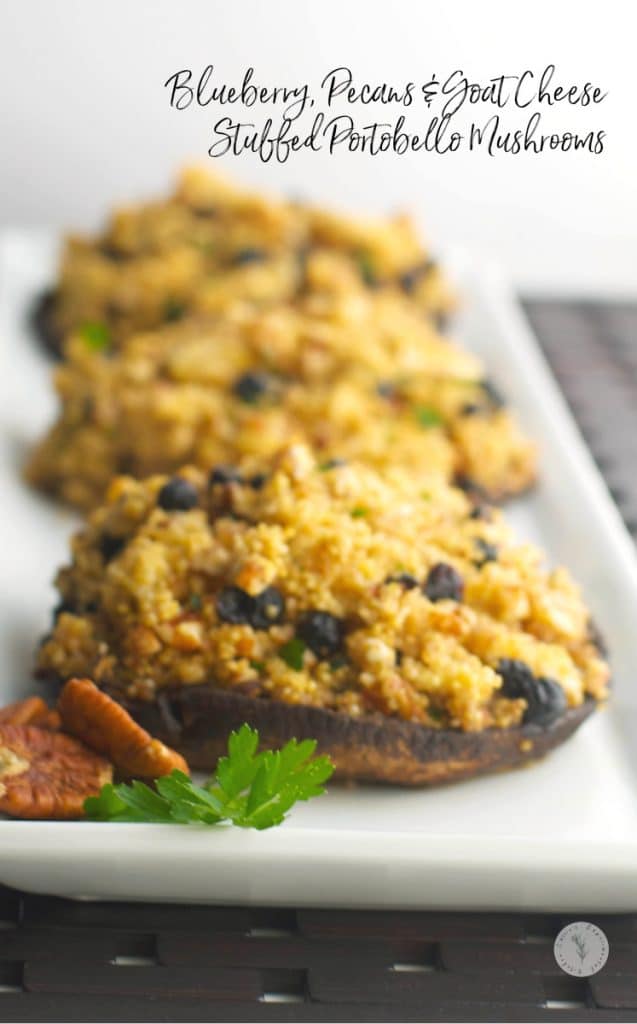 Portobello mushrooms stuffed with blueberries, pecans, crumbled goat cheese and quinoa is a healthy weeknight meal idea that's loaded with flavor.