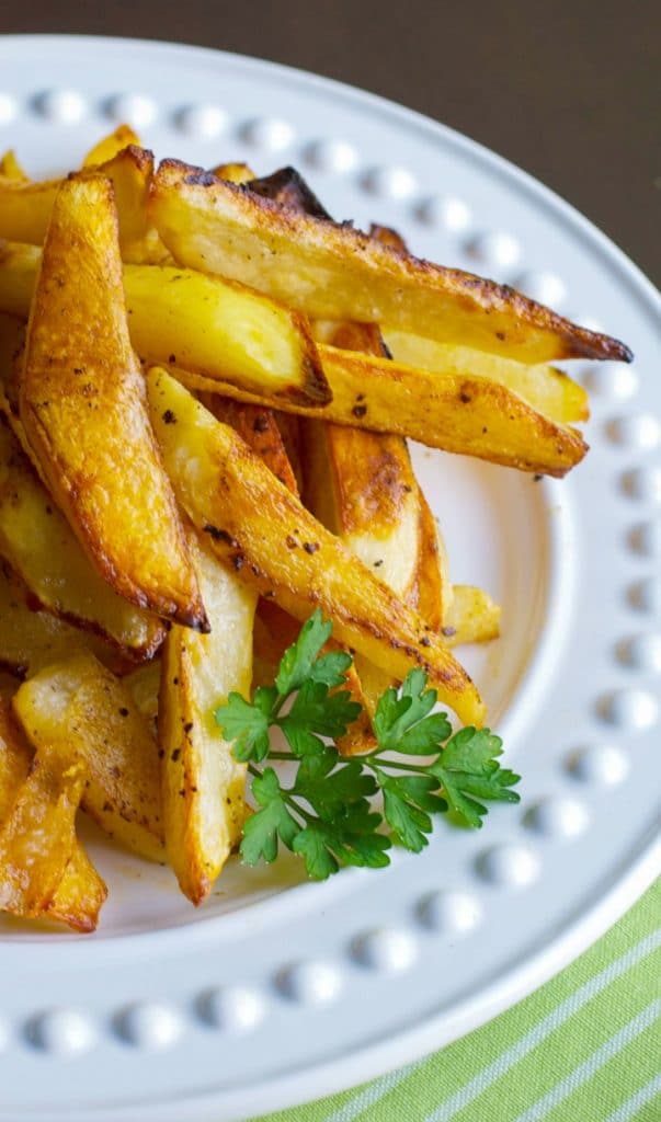  Buffalo Roasted Potato Wedges made with russet potatoes and tossed with melted butter and hot sauce; then roasted until golden brown.  