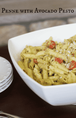 A bowl of penne with avocado pesto