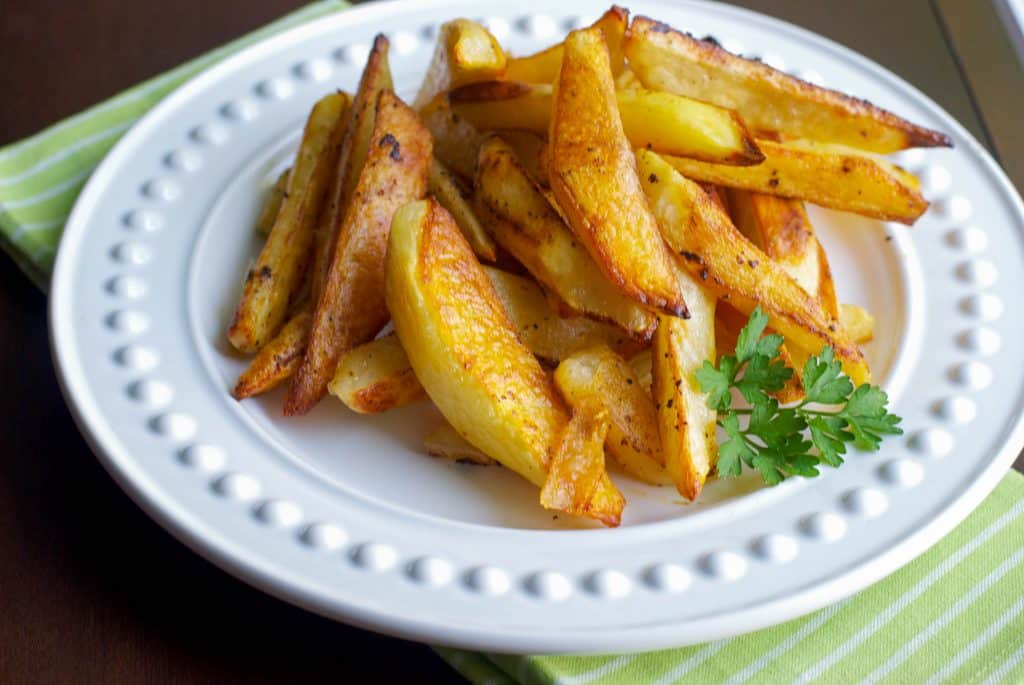 Buffalo Roasted Potato Wedges on a white plate