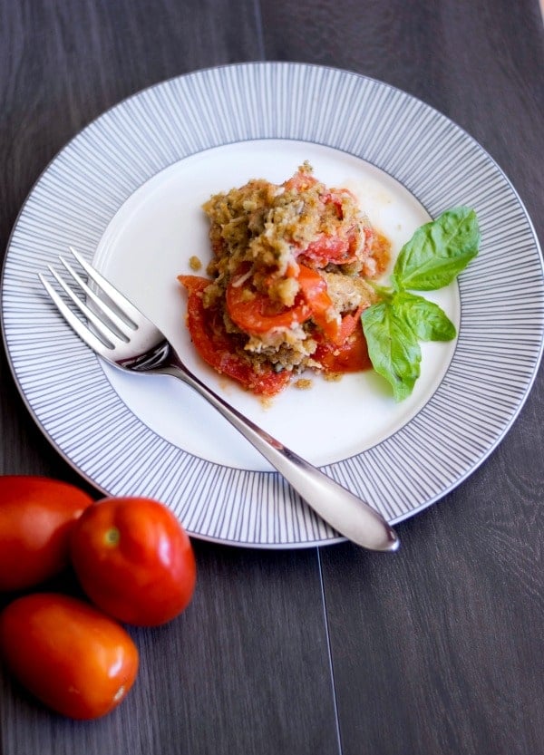 Tomato Gratin on a plate with a fork.