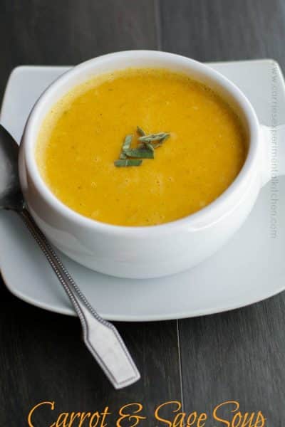 Carrot and Sage Soup in a white bowl.