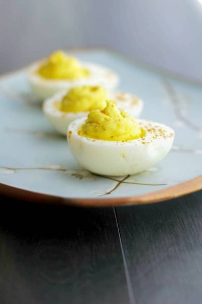 Deviled Eggs made with wasabi paste and horseradish are sure please those that love a little heat in their food.