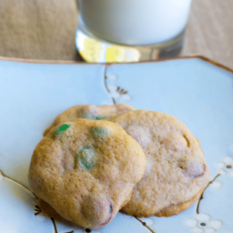 Soft and chewy Pumpkin Spice M&M Cookies go perfectly with a tall glass of milk for an afternoon snack or special Fall treat.