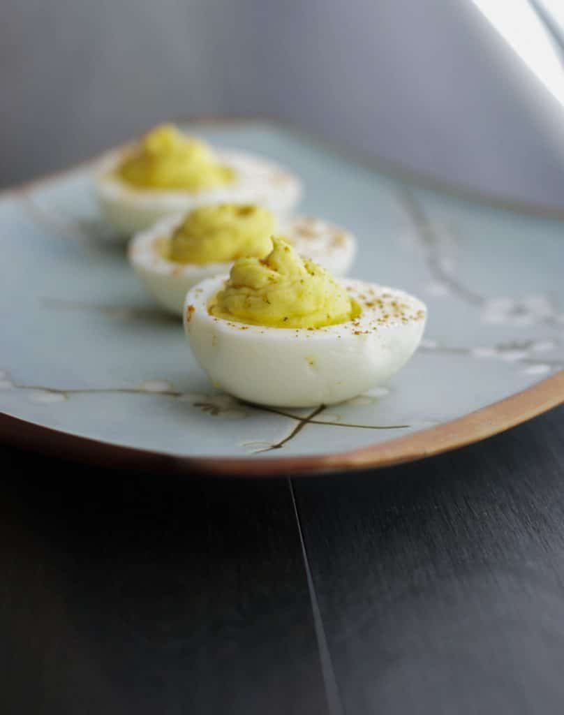 Deviled Eggs made with wasabi and horseradish are sure please those that love heat in their food. Perfect for picnics or game day snacking!