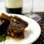 Beef short ribs slowly cooked in red wine, garlic, rosemary and two types of mustard are so tender and delicious.