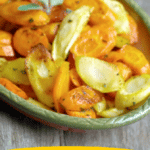 long photo of a close up of roasted carrots and parsnips