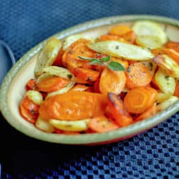 A close up of sliced carrots and parsnips