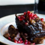English cut beef short ribs slowly simmered in pomegranate juice, Cabernet wine and fresh rosemary is a tasty, comforting meal.