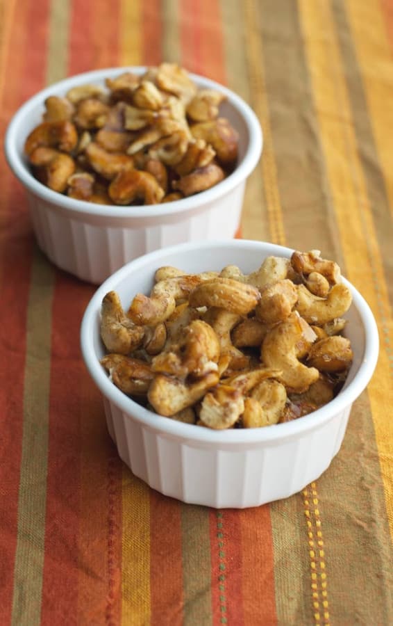 Whole cashews tossed with honey, ground cinnamon and salt; then roasted until golden brown make the perfect sweet and salty snack. 