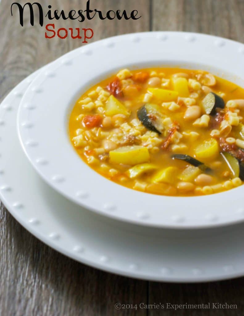 A bowl of food on a plate, with Soup and Minestrone