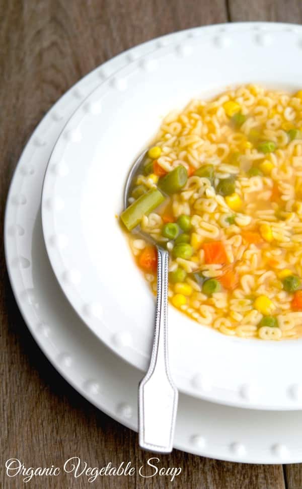 Alphabet Soup in a bowl with a spoon. 