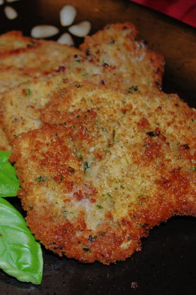 a close up of Pork Milanese on a plate