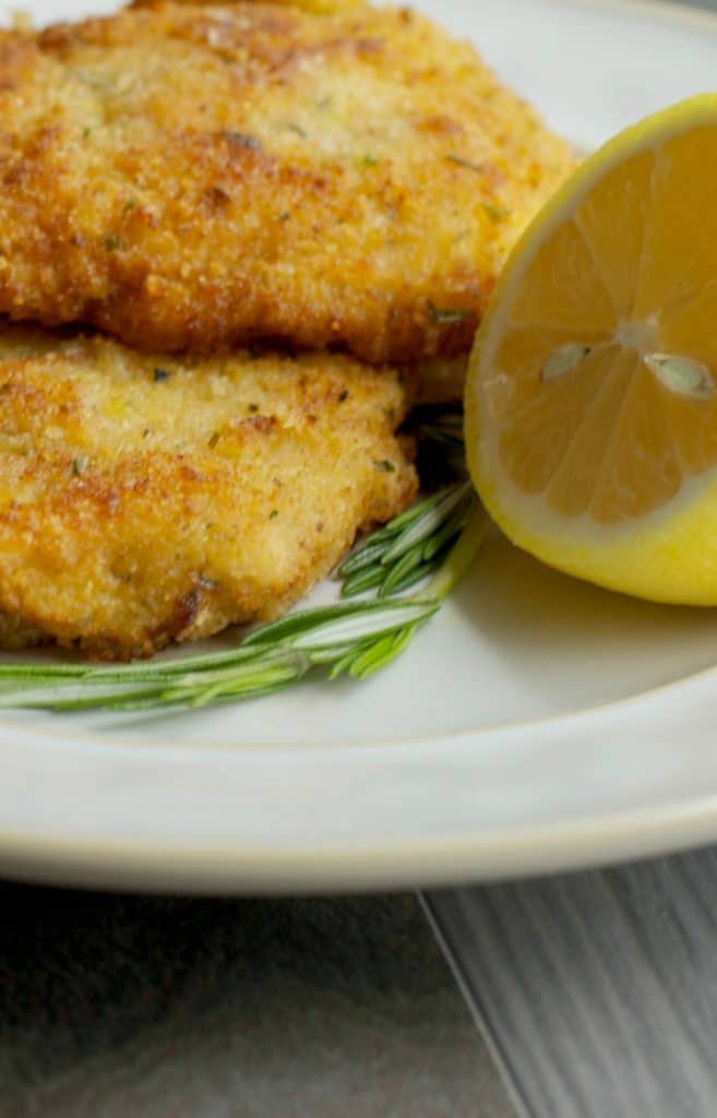 Pork Milanese is a breaded pork made from boneless center cut pork loin and pounded thin and can be served with fresh lemon juice on top of salad. 