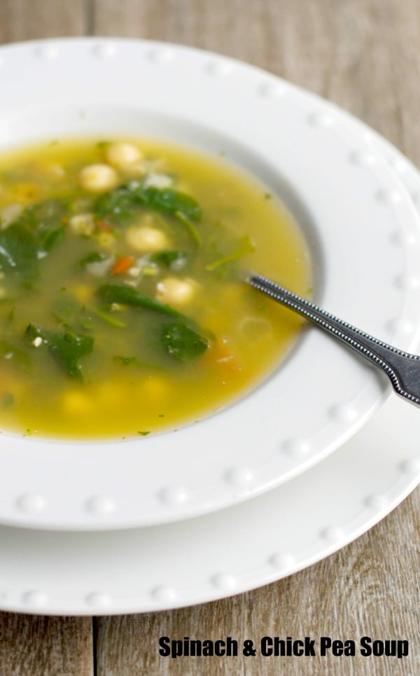 Spinach & Chick Pea Soup is a light, broth soup made with fresh spinach, tomatoes, garlic and chick peas. Satisfying for lunch or dinner.