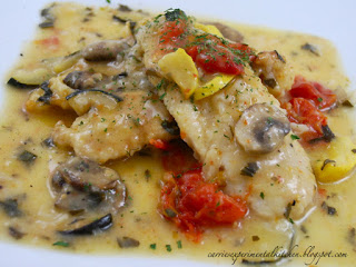 A close up of boneless chicken in roasted vegetable pummelo sauce.